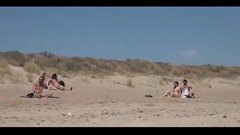 Swinger nudist girl caught fucking with strangers on a beach