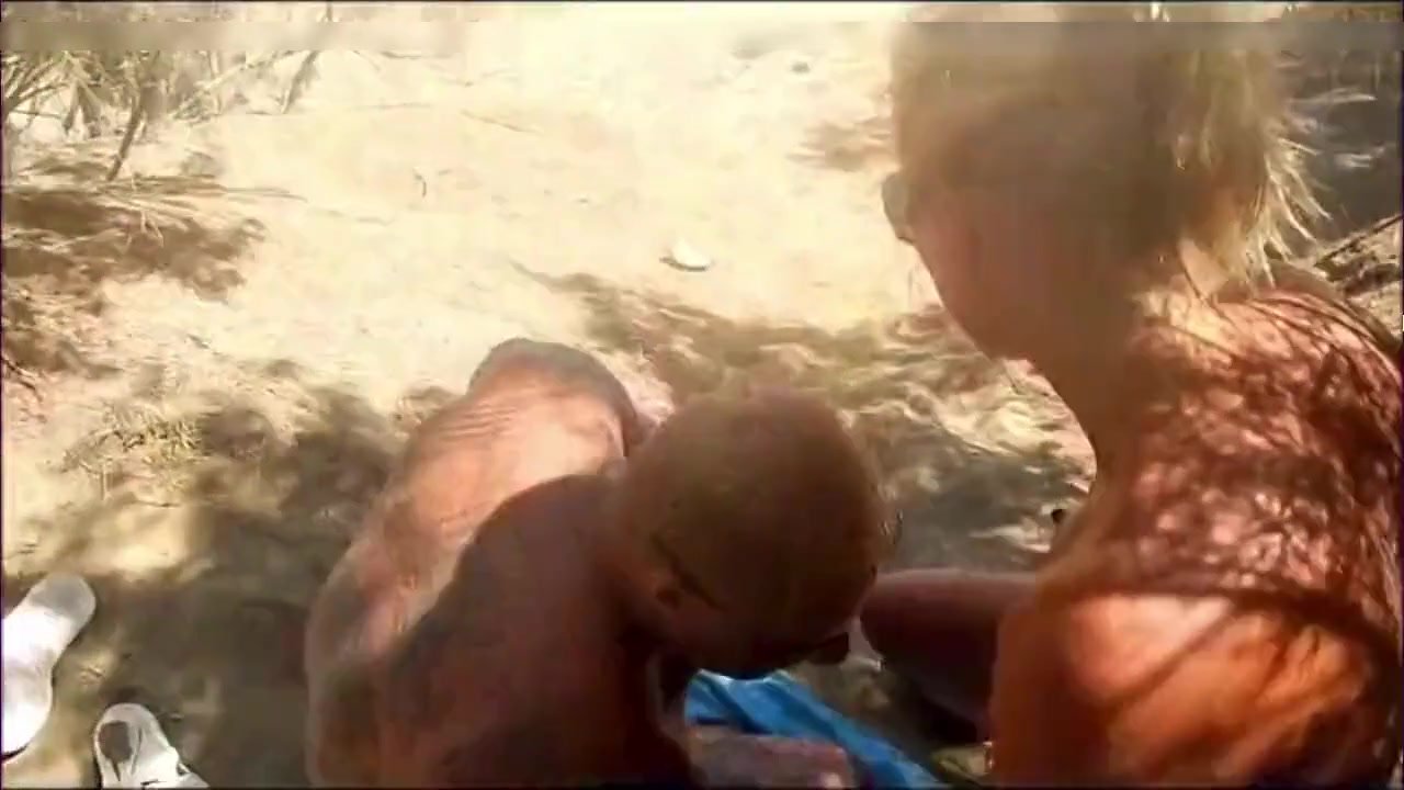 Slut blonde takes multiple cum in mouth from strangers at the beach foto