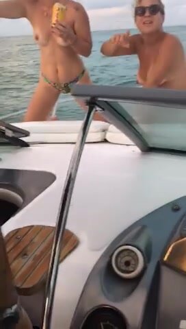 Naked woman flashing and posing on private boat