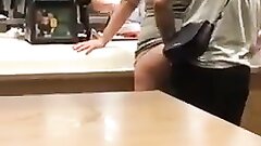 Dude caught sticking penis in his female partner's butt at quick food store