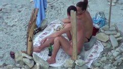 Nudist wife caught doing oral sex at the beach on voyeur cam